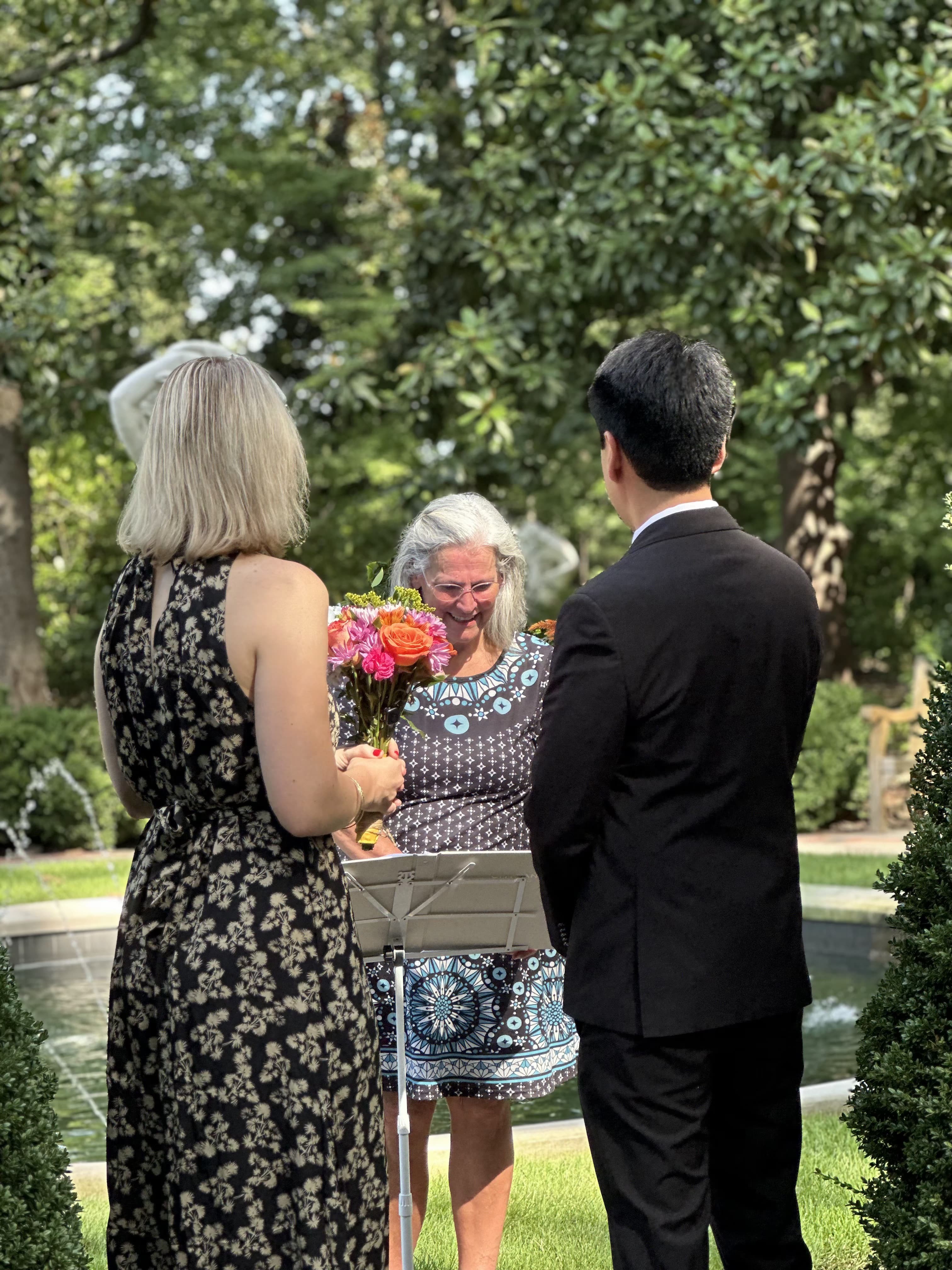 Beth officiating a wedding ceremony